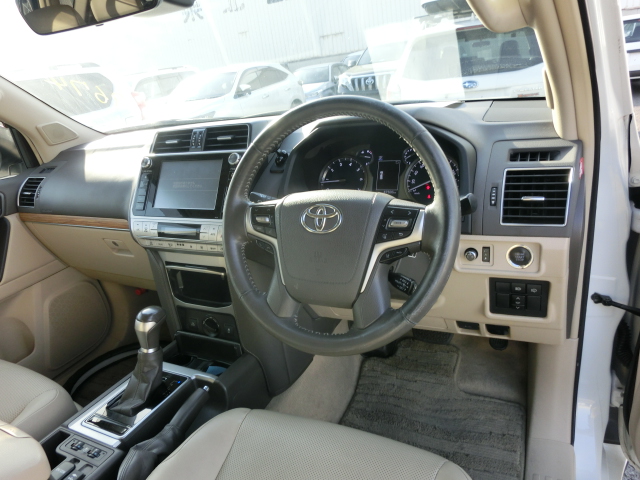 Toyota Landcruiser Prado -NEW SHAPE Pearl 2017 Year “TX -L PKG” TRJ150W 2700cc with SUNROOF , ROOF RAILS , RECTANGULAR HEADLIGHTS AND BEIGE LEATHER SEATS Auto Petrol with Full options.